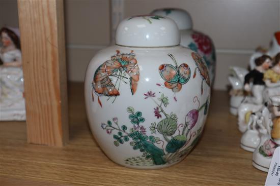 Two Chinese famille rose ginger jars and covers height 15cm